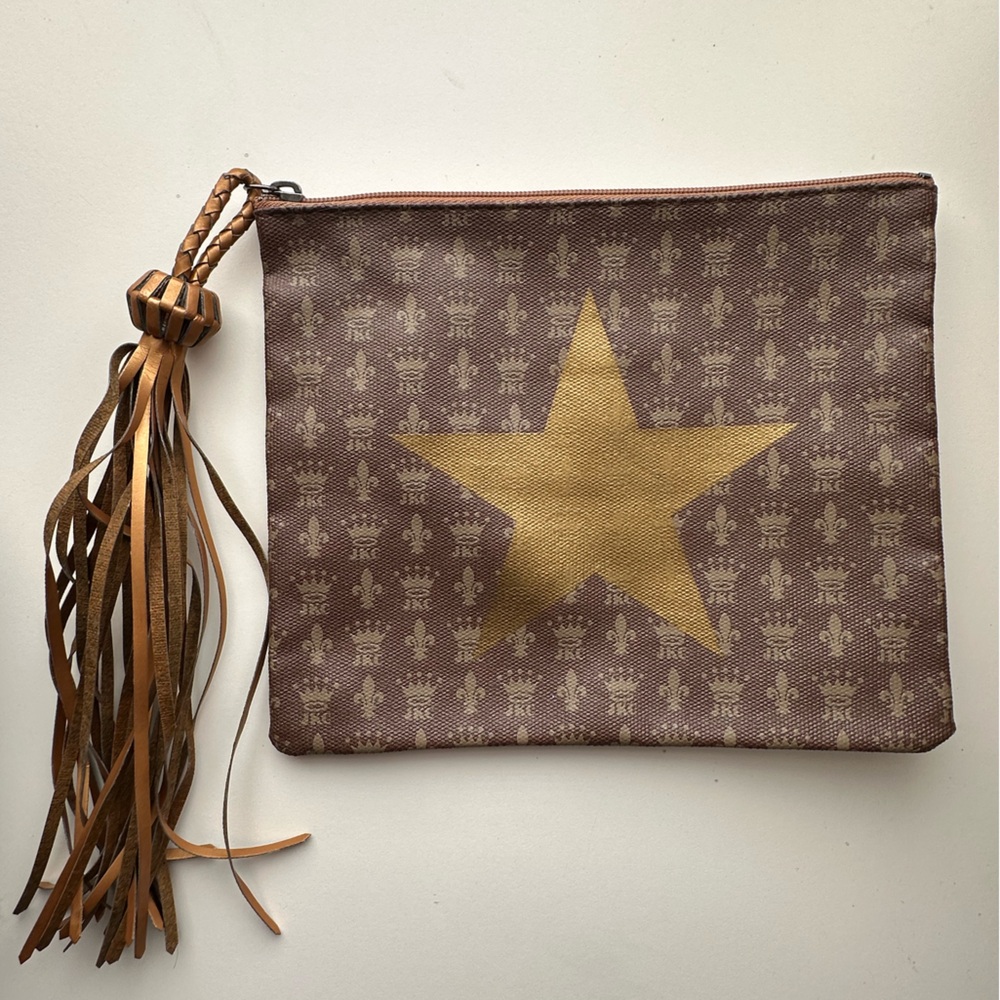 Jessica Kagan Cushman star tan pouch with tassle!